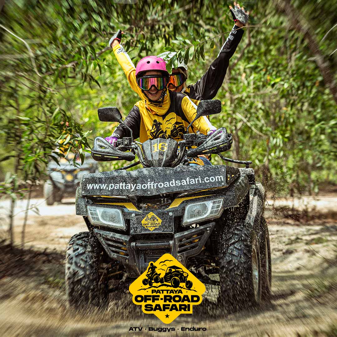 ATV quad bike riders splashing through a Pattaya off-road trail