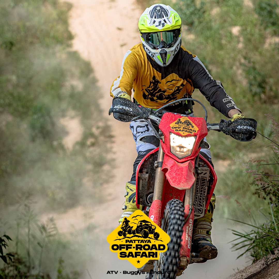 Enduro dirt bike rider on a forest trail near Pattaya